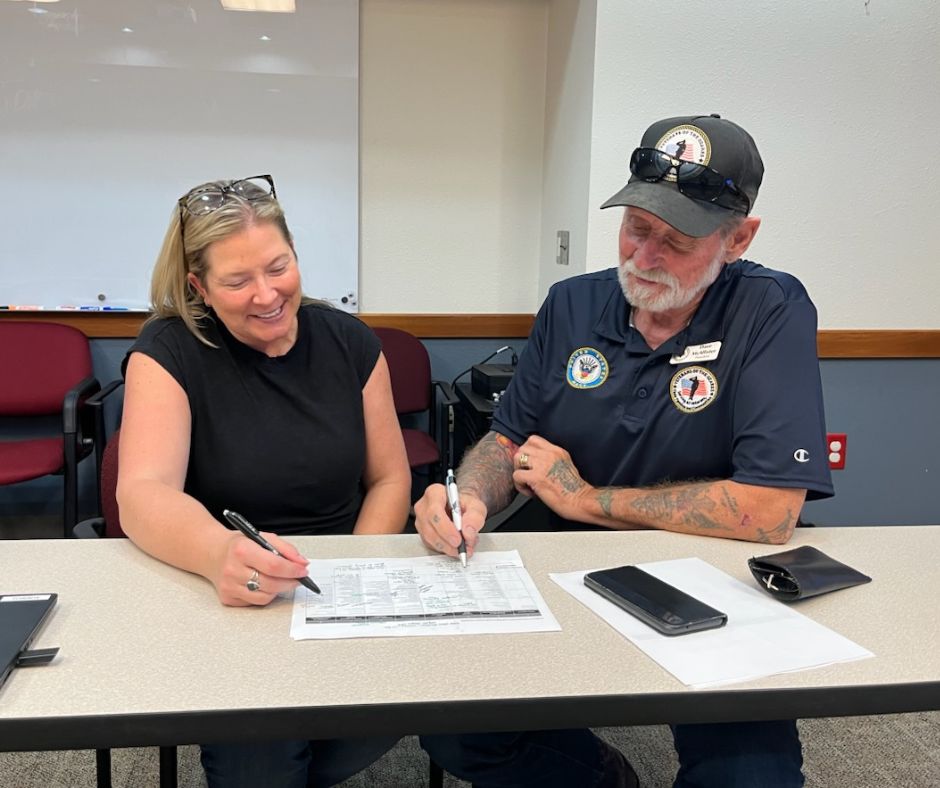 TCHD employee with a community partner